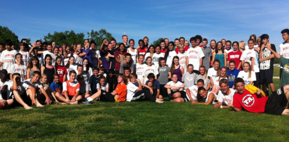 group photo of students on field