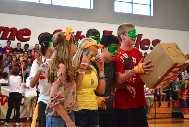 students wearing green and yellow masks